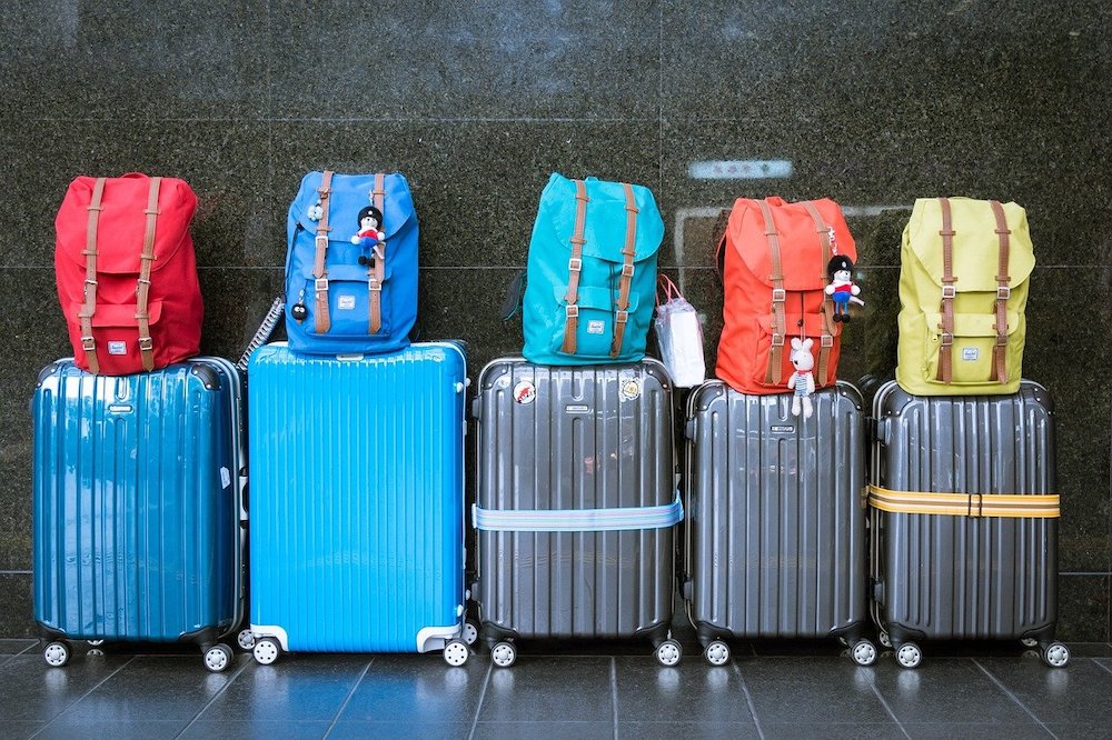 gray and blue suitcases