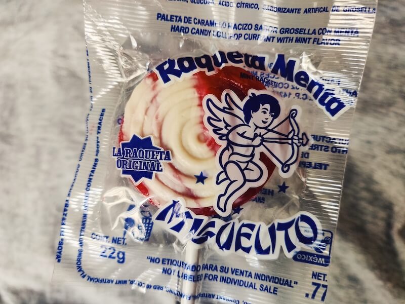 Mexican red and white hard candy lollipop Miguelito Raqueta Menta