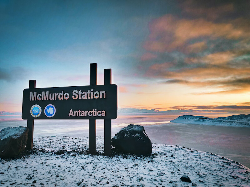 McMurdo Station sign during sunset