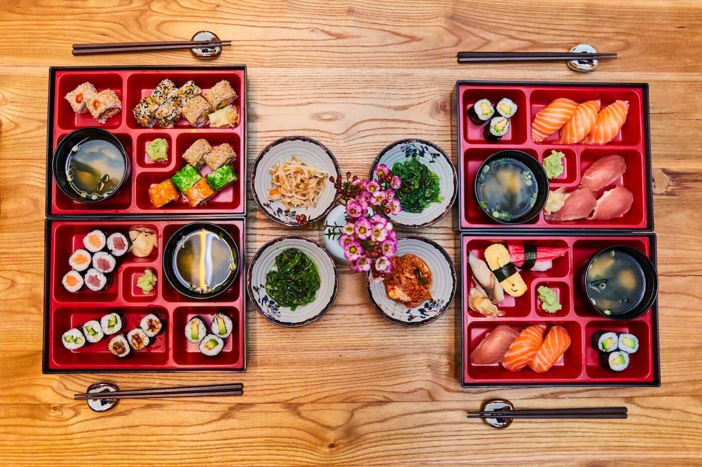 japanese food displayed in red lacqured boxes