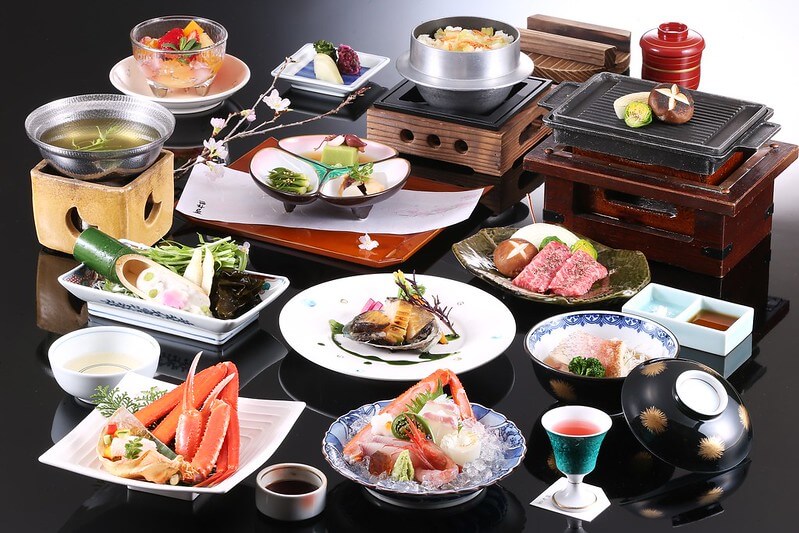 elaborate kaiseki multi-course japanese meal with many small dishes