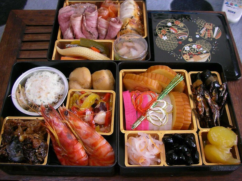 colorful boxes of osechi