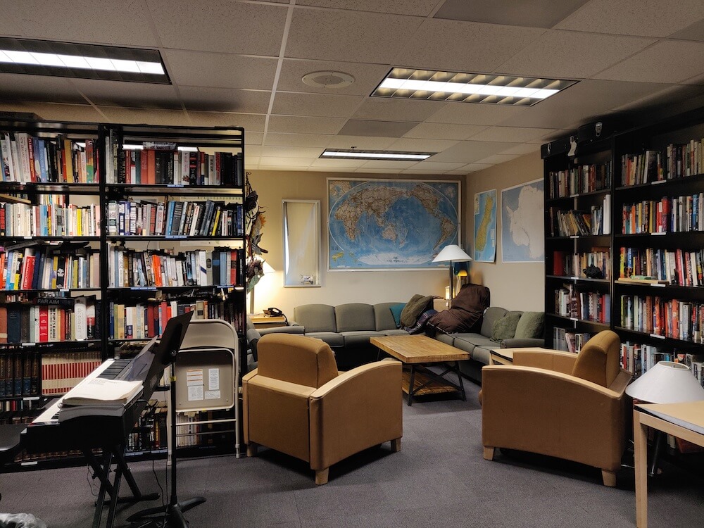 The Quiet Reading Room at South Pole Station includes sofas, a small library, and keyboard