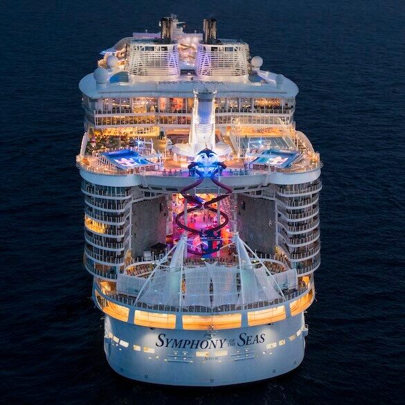 Aerial photo of Royal Caribbean's Symphony of the Seas after sunset at sea