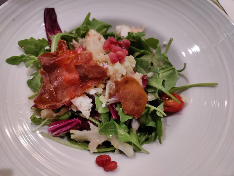 Salad from Symphony of the Seas' Main Dining Room with radishes and tomatoes