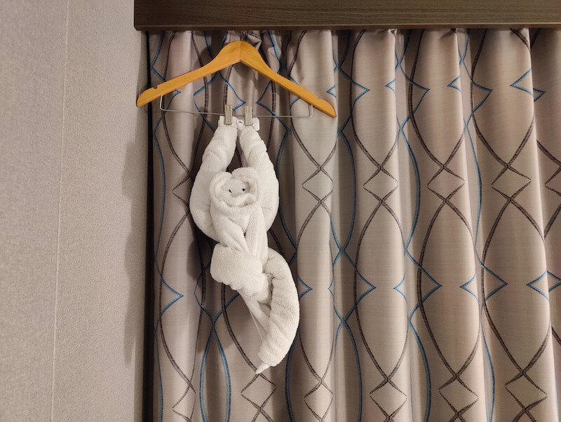 towel monkey hanging from a hanger