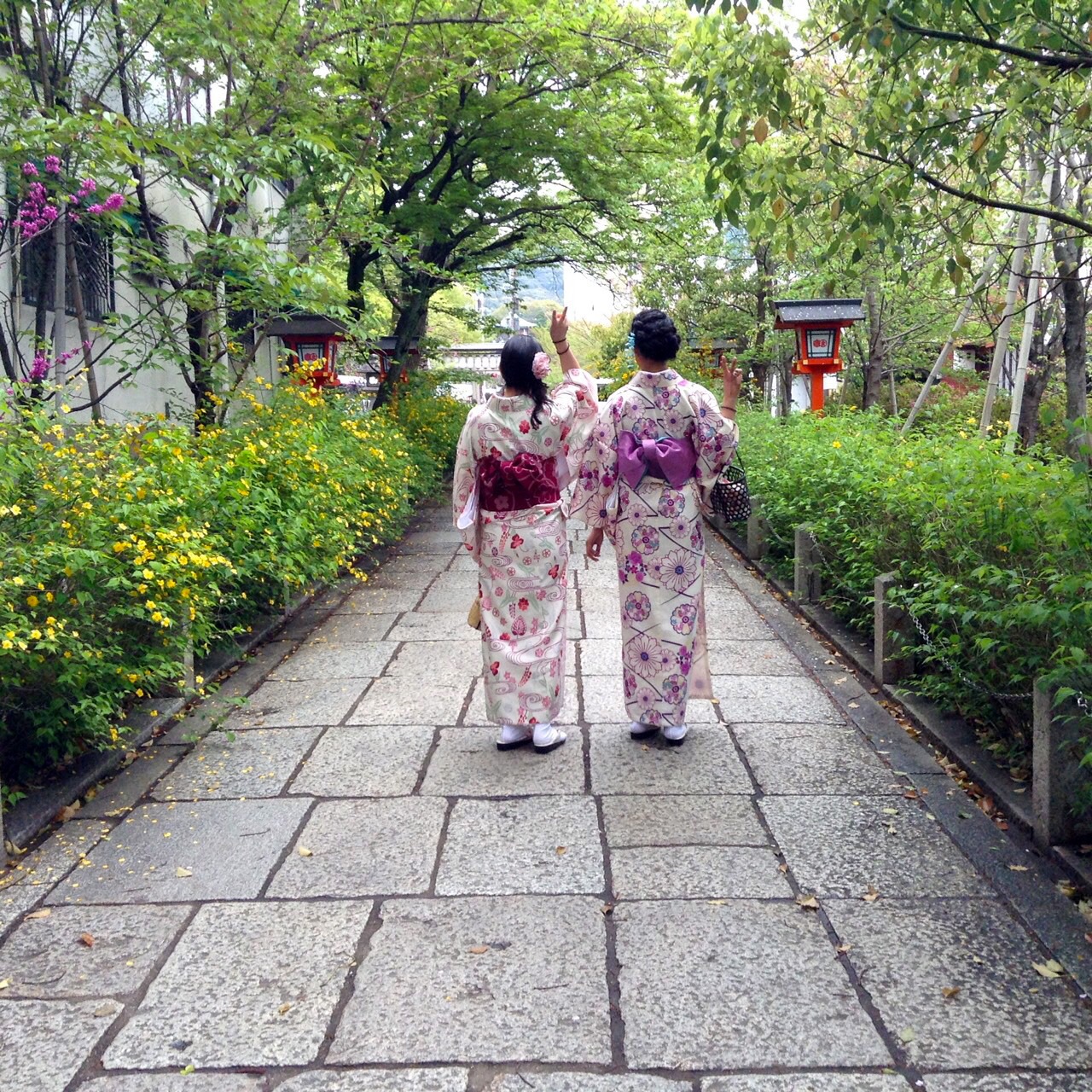 Two women wear kimono in Kyoto