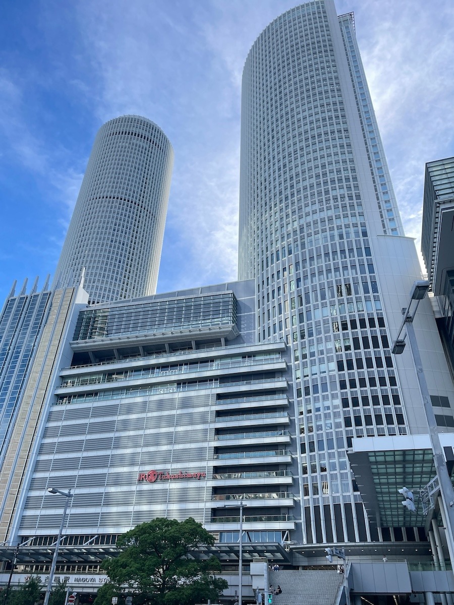 Twin tower buildings (JR Central Towers) in Nagoya Japan under blue skies