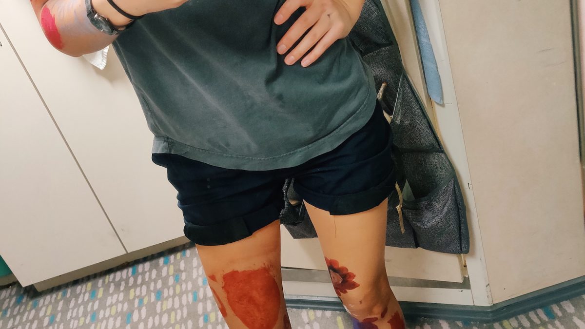 Becoming a human canvas while working on cruise ships and getting painted by kids