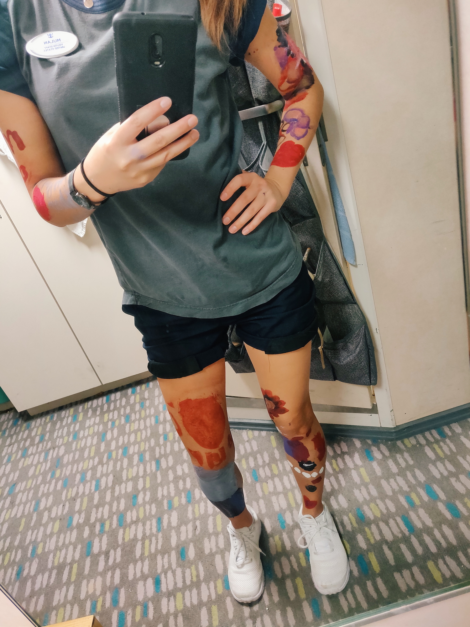 Becoming a human canvas while working on cruise ships and getting painted by kids