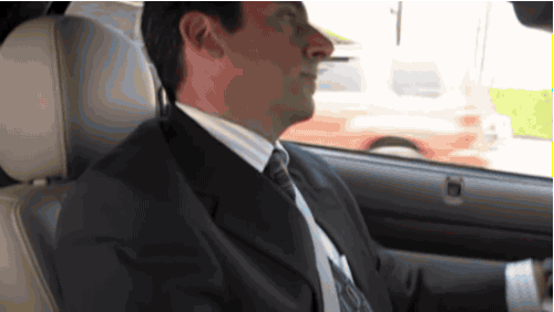 Scene from The Office where Michael drives his car into Meredith