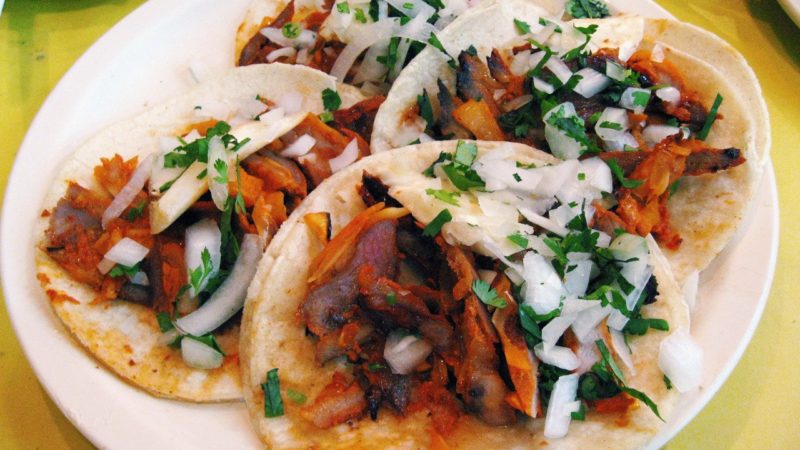 Four tacos al pastor with onions and cilantro at El Fogon tacqueria in Playa del Carmen