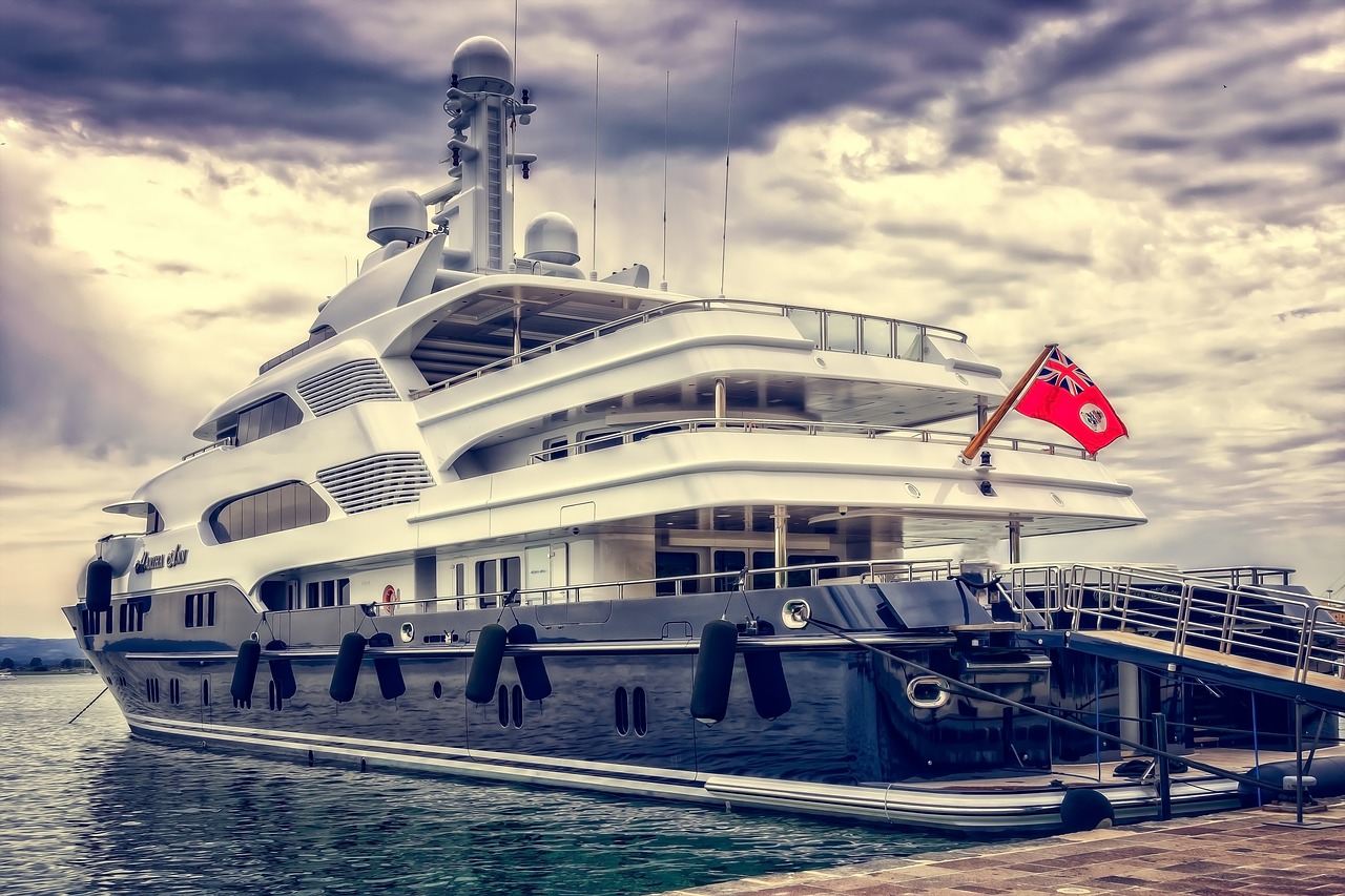 Blue and white yacht docked