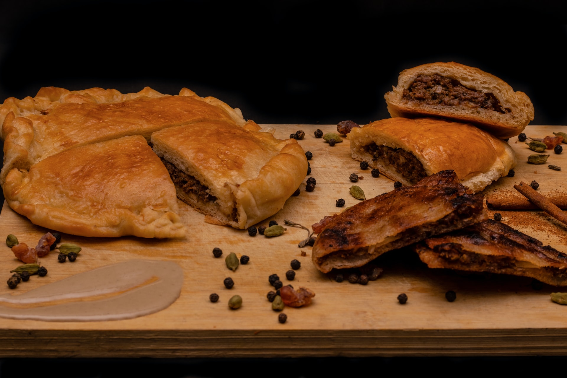 hawawshi: pita filled with minced meat, onions, pepper, and parsley