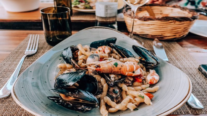 cooked shrimp and seashell dish