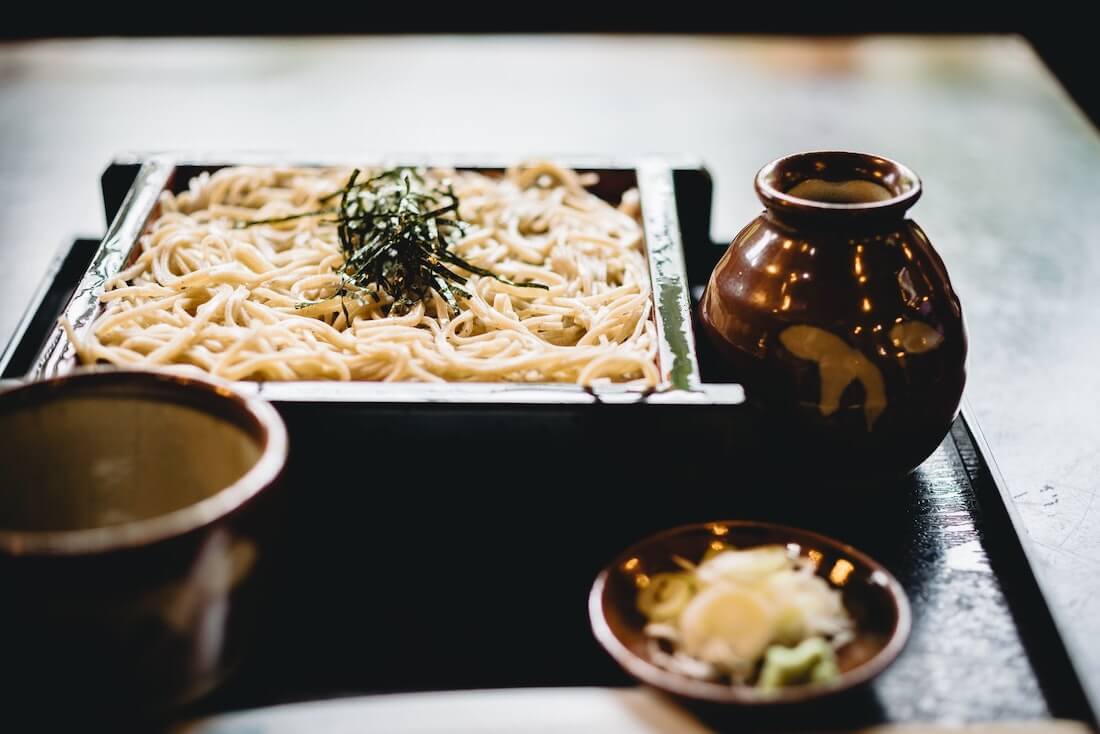 soba noodles, sauce, and garnishes