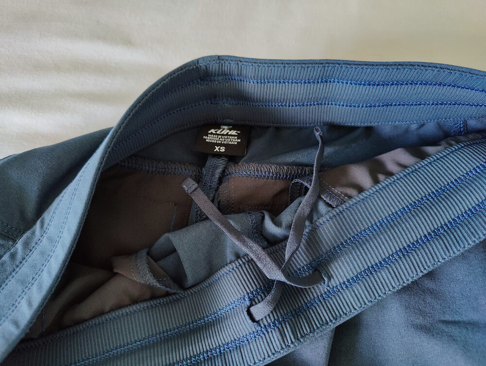The wide waistband and drawcord inside the KUHL women's Freeflex hiking short in the color Rainstorm blue