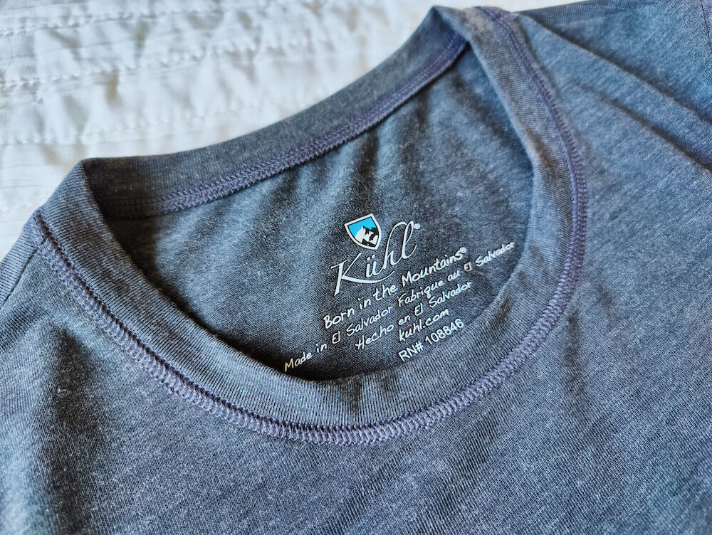 Crew neck top of Kuhl's Konstance Sun Protection shirt in black/charcoal