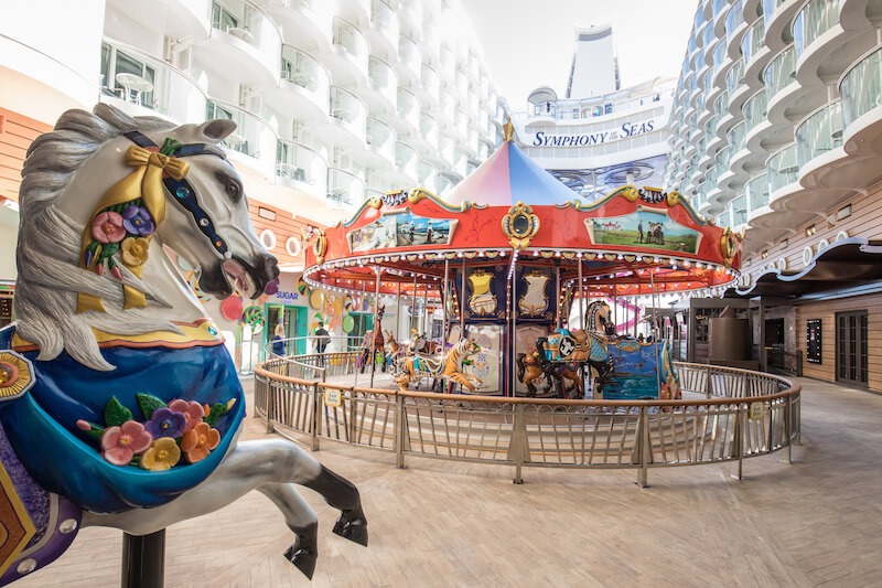 Beach-themed horse carousel aboard Symphony of the Seas