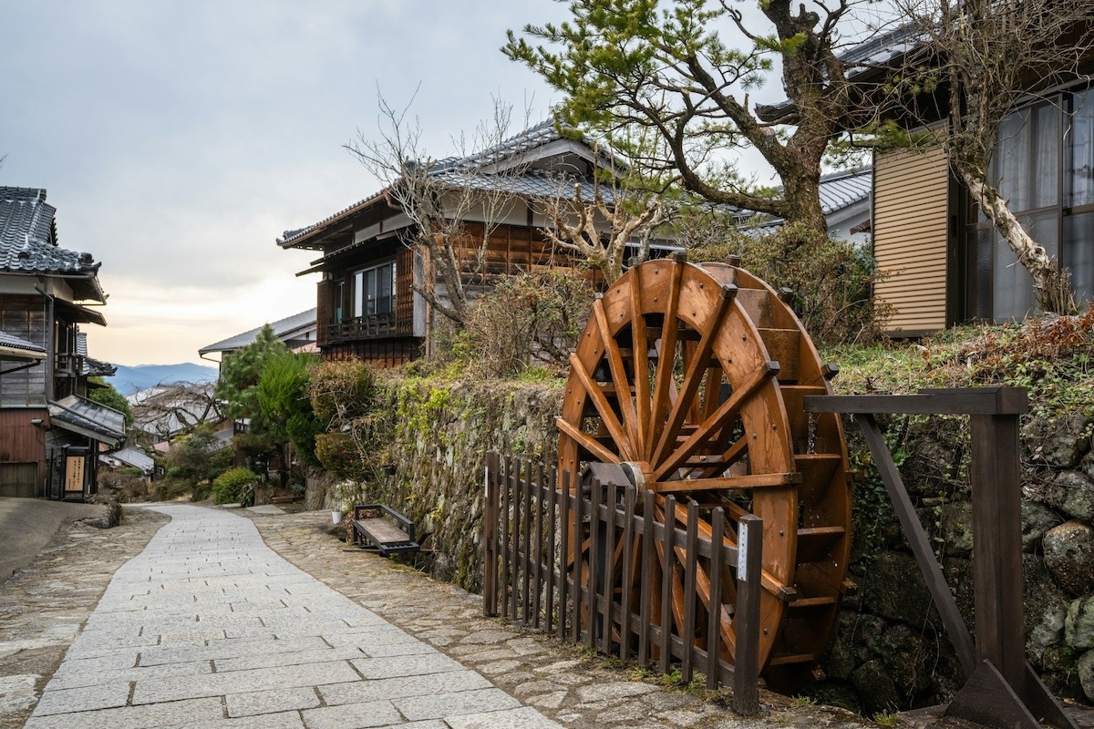 The pedestrian walkway in Magome with lined by traditional Japanese houses and a water wheel